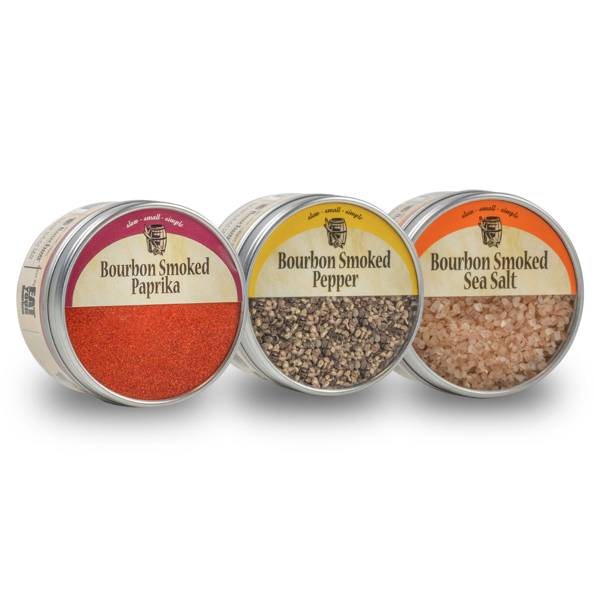 Three spice jars: bourbon smoked paprika, smoked pepper, and bourbon smoked sea salt