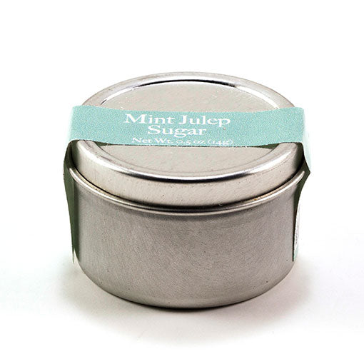 Closed round metal sugar tin with teal label strip