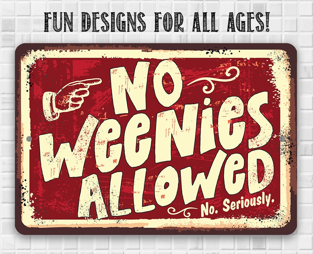 Red metal wall sign with cream border text: “No Weenies Allowed” with hand symbol.