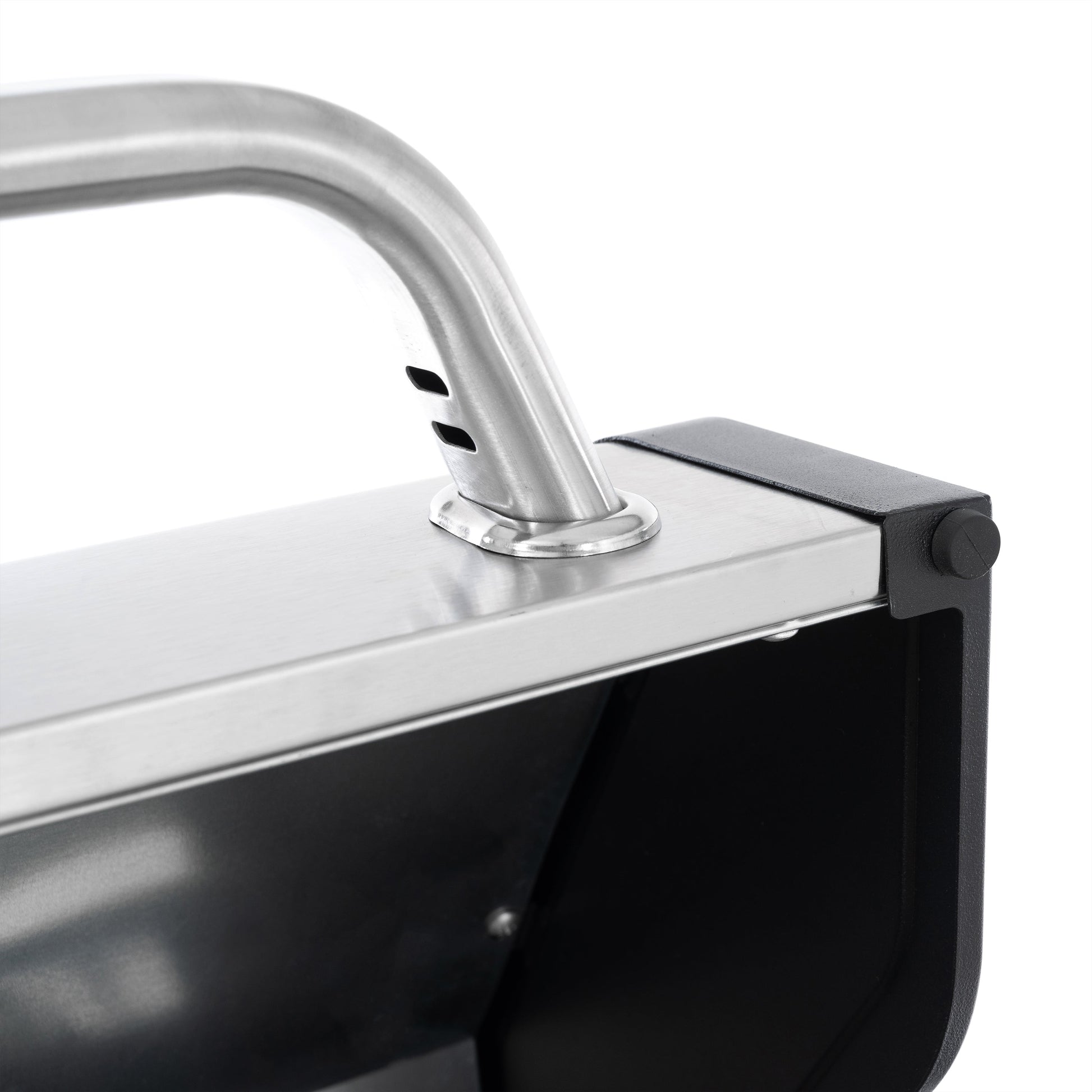 Black and silver gas grill griddle lid handle and control area on the side