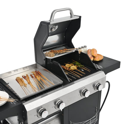 Black gas grill with open hood and griddle, skewers and buns on cooking surfaces