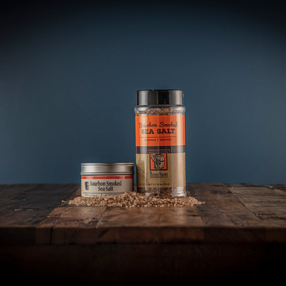 Bourbon smoked sea salt jars and tin with coarse pink salt grains