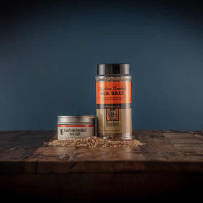 Bourbon smoked sea salt jars and tin with coarse pink salt grains