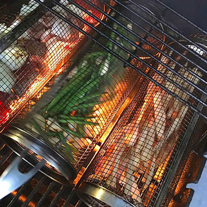 Round mesh BBQ baskets filled with vegetables and meat over open flames