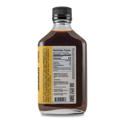 Kentuckyaki™ sauce bottle with amber liquid and back label panel, black cap