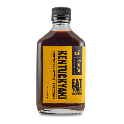 Kentuckyaki™ sauce bottle with amber liquid, black cap, yellow label