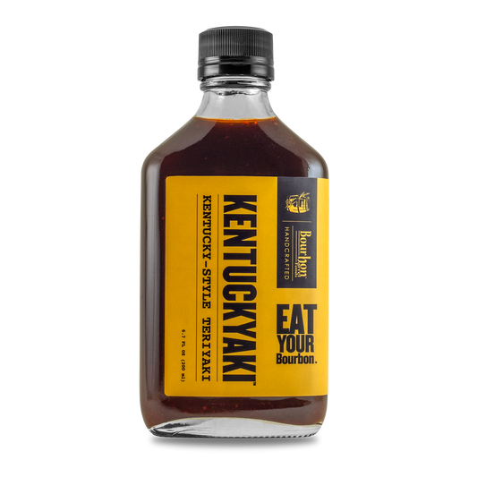 Kentuckyaki™ sauce bottle with amber liquid, black cap, yellow label