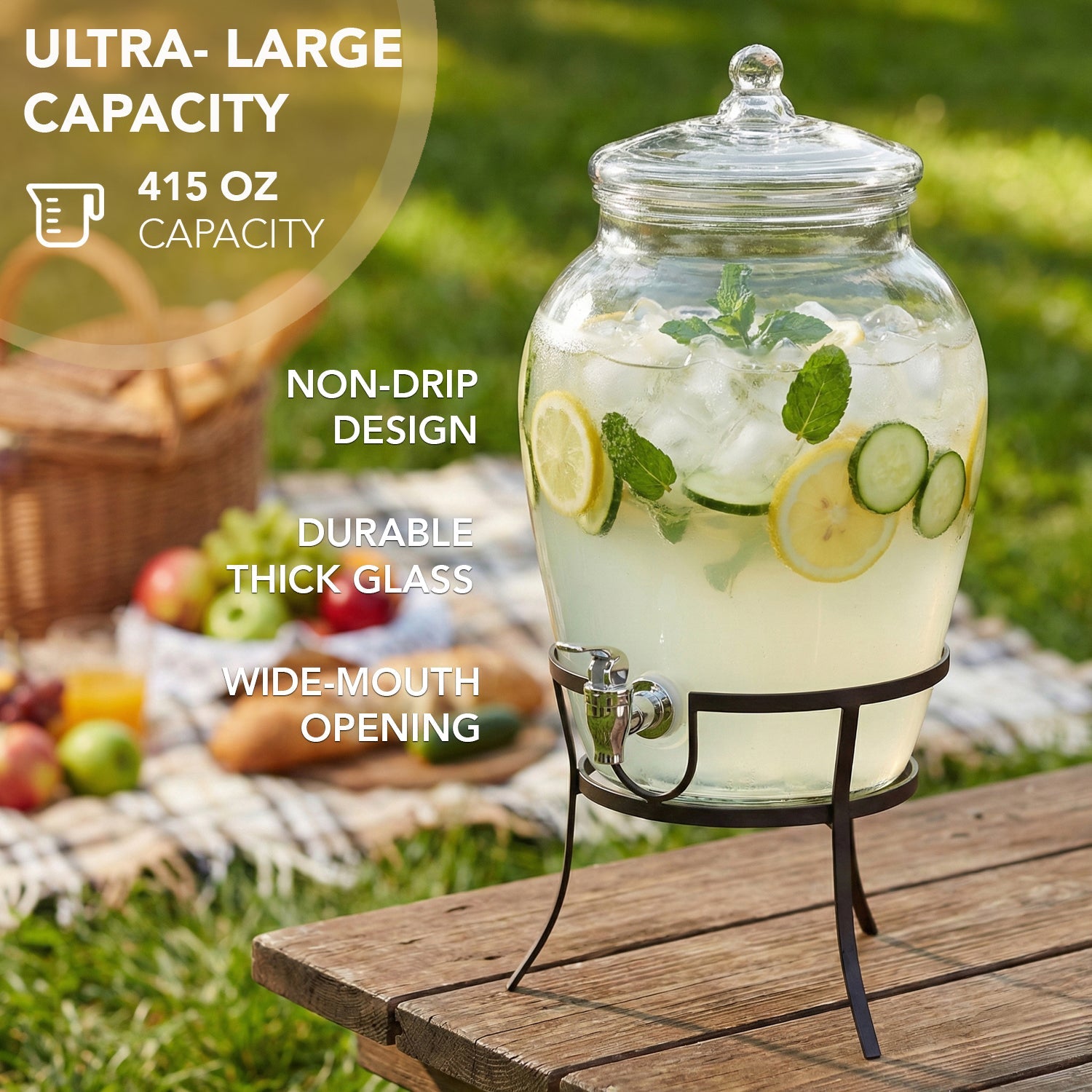Large glass beverage dispenser with clear lid and metal stand, filled with cucumber and mint