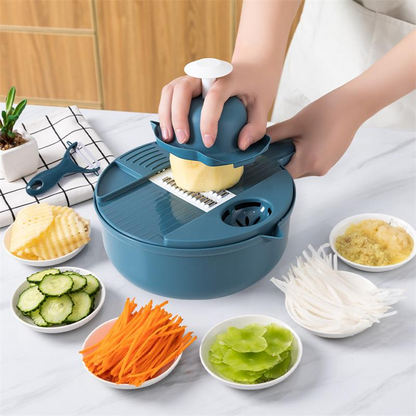 Teal salad chopper with bowl and hand-held lid, inserted blade