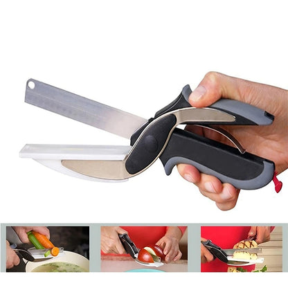 Kitchen scissors with built-in cutting board, black ergonomic handle held in hand