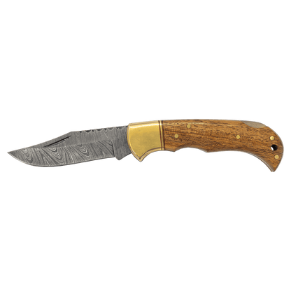Damascus steel knife with Acadia wood handle and brass-colored guard