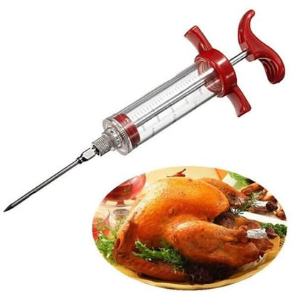 Marinade injector syringe with red side handles, clear barrel and needle tip