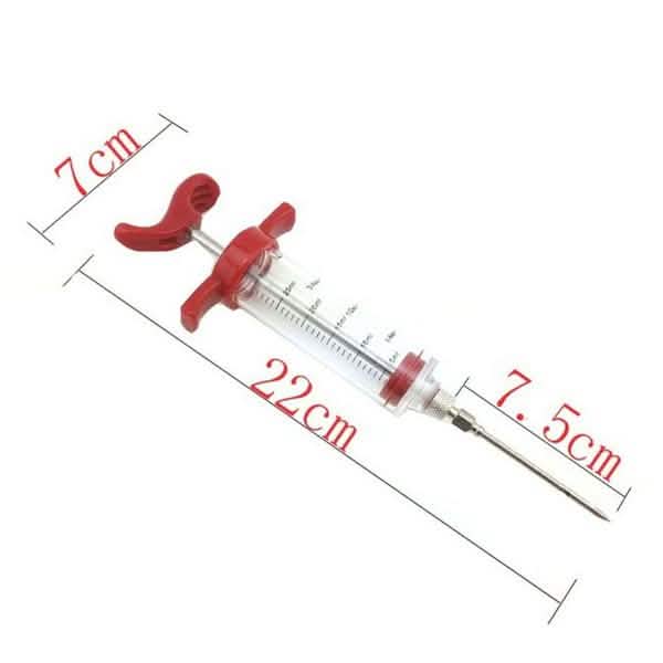 BBQ marinade injector syringe with red grips, length marked 22cm and 7cm