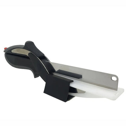 Kitchen scissors with built-in cutting board, black handle, white board and silver blade