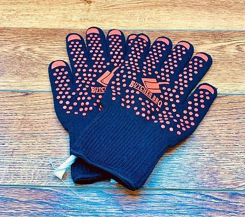 Blue grill gloves with red dot pattern and “Butcher BBQ” lettering