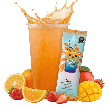 Loaded tea drink with strawberry-mango color in clear cup and tea stick packet
