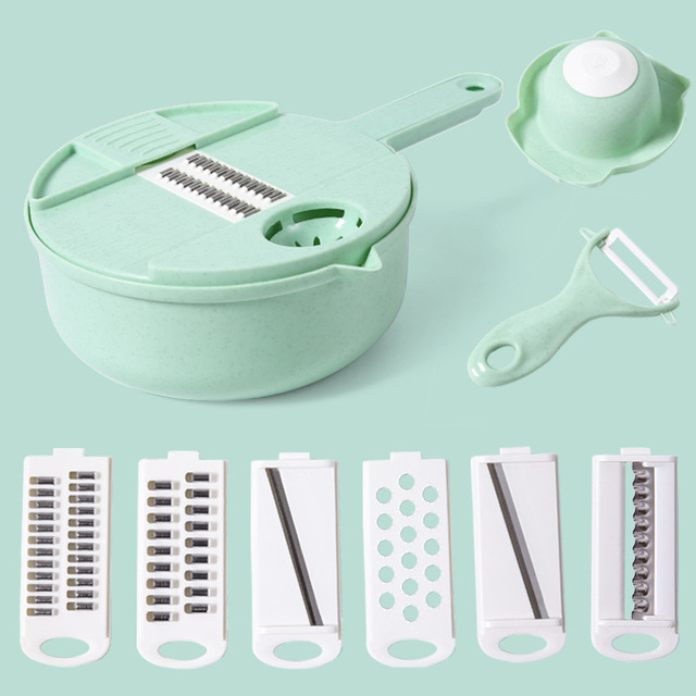 Mint green salad chopper bowl with slicer, grater, and handle peeler