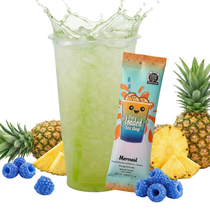 Iced green tea drink in tall cup with Mermaid energy mix stick packet.