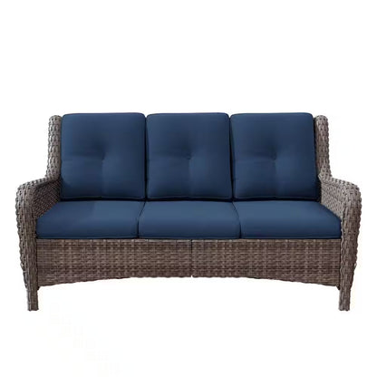 3-seat wicker sofa with dark blue seat and back cushions, straight arms