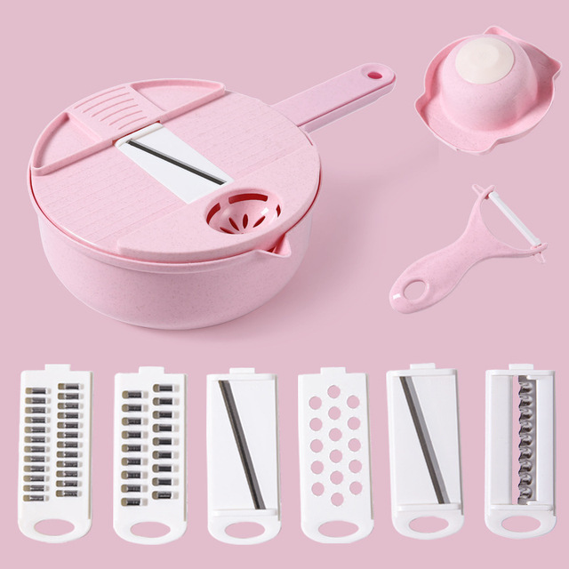 Pink salad chopper bowl with grater insert and handle peeler