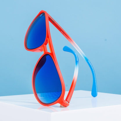 Red aviator sunglasses with blue mirrored lenses, angled side view of temples.