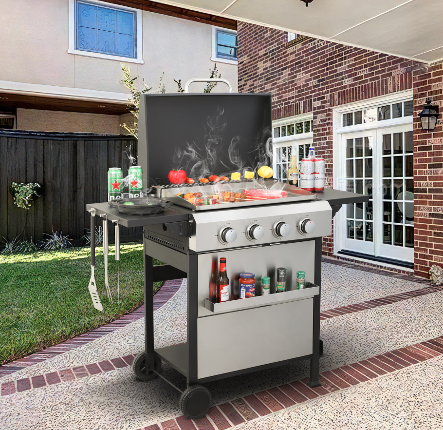 Propane gas BBQ grill with stainless steel plancha and four control knobs, open lid