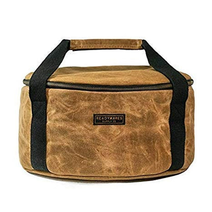 Insulated Dutch oven cover with tan top panel, black handles, and zipper