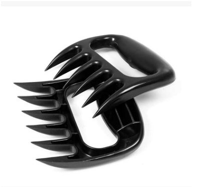 Black bear-claw meat shredder tool with long metal prongs and curved grips
