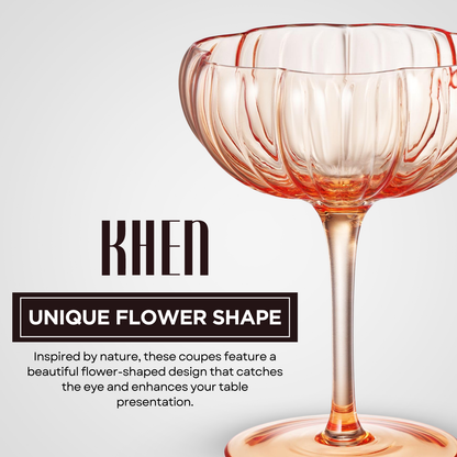 Orange flower-shaped coupe cocktail glass with scalloped bowl and slender stem base
