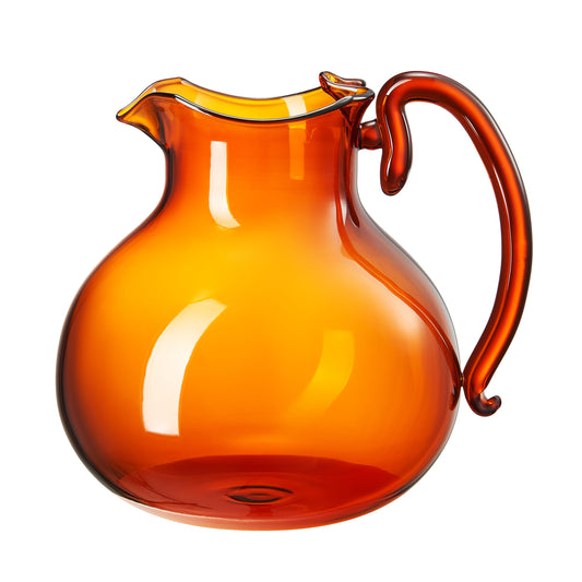 Amber glass jug with curved handle and wide rounded body