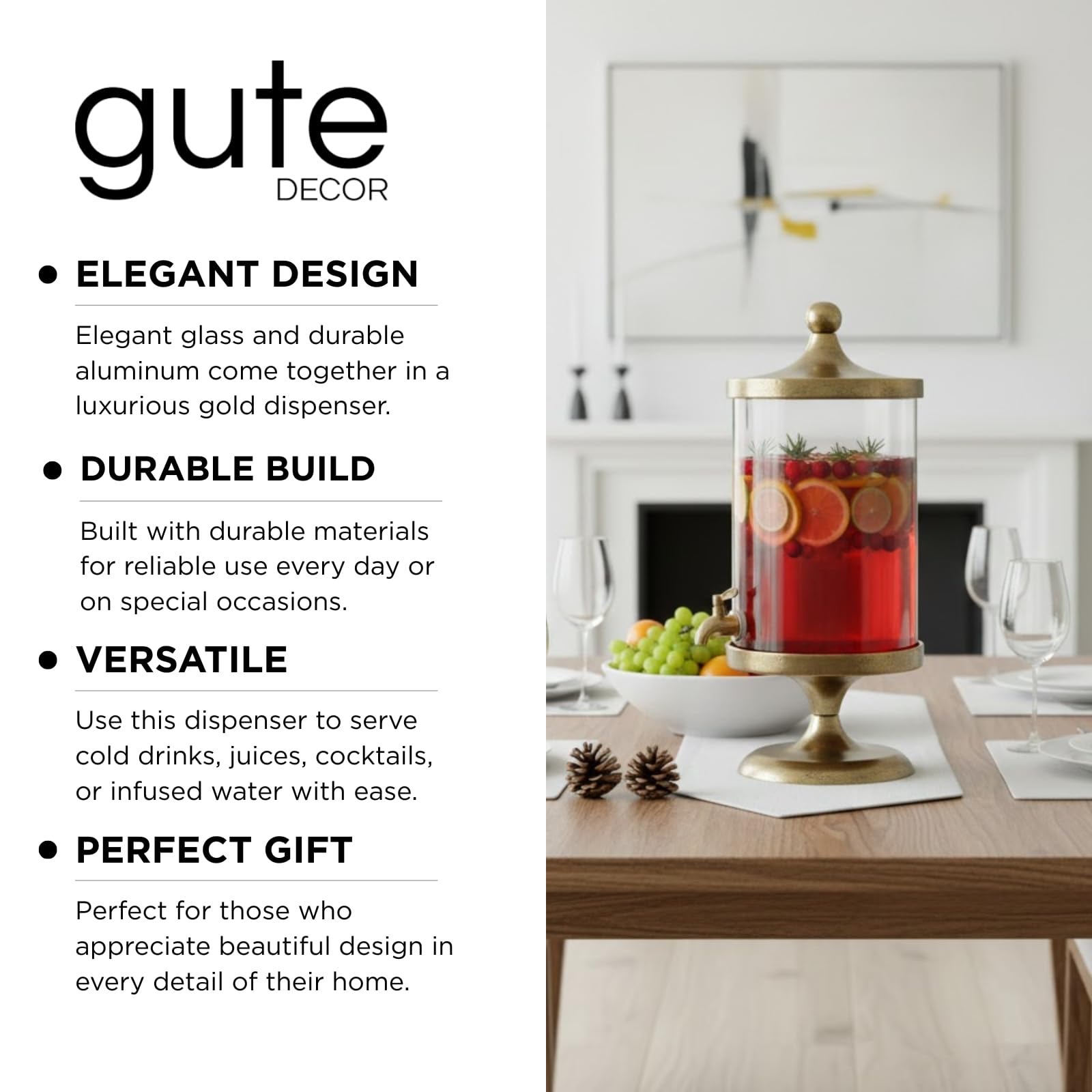 Gold-finish beverage dispenser with clear glass cylinder and gold spigot, filled with red drink