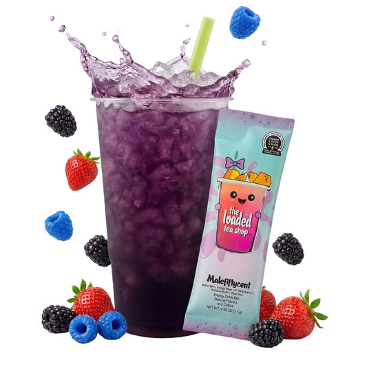 Purple loaded tea drink in clear cup with ice, berries, blue straw, and pouch