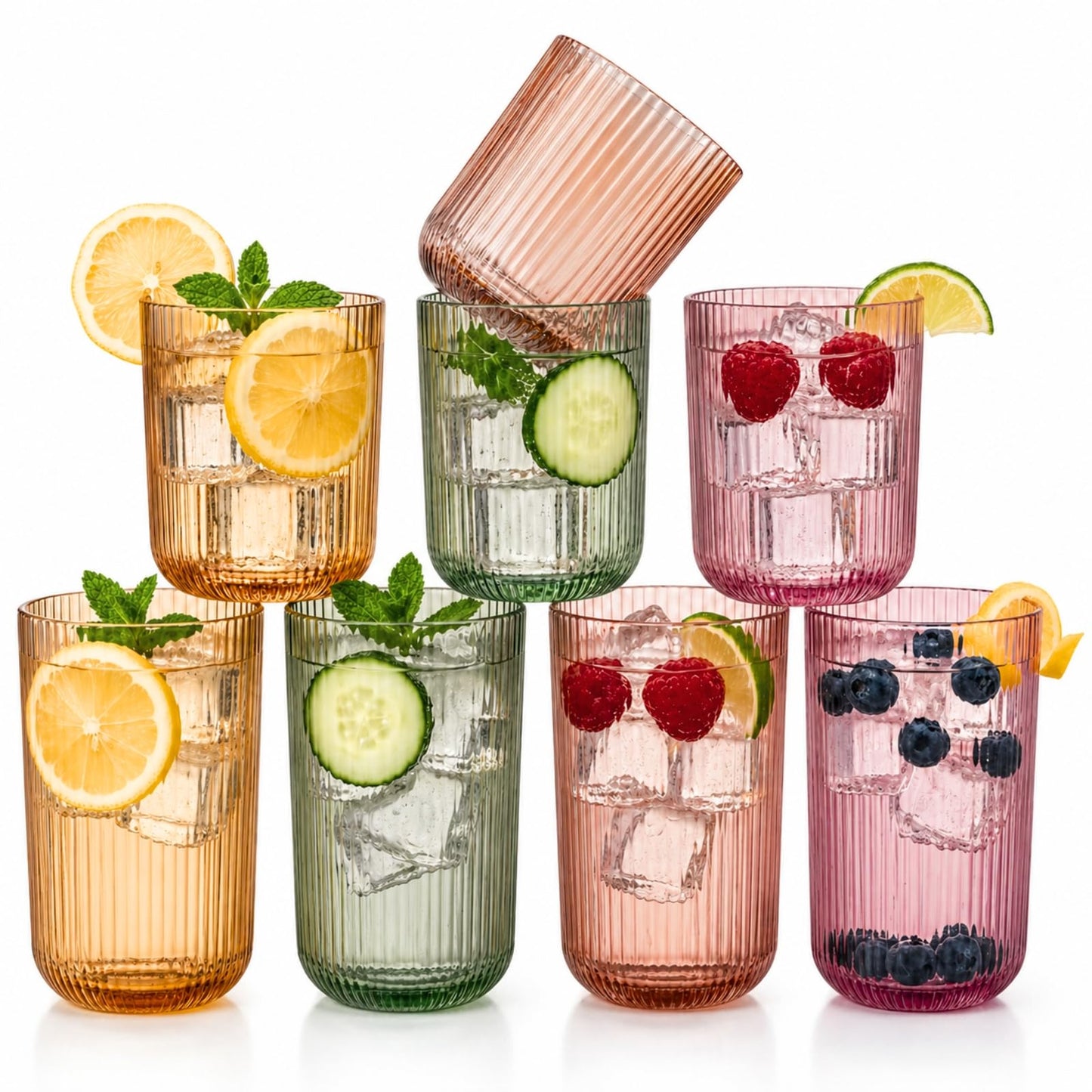 Set of 8 ribbed drinking glasses with citrus and berries in amber, green, and pink cups
