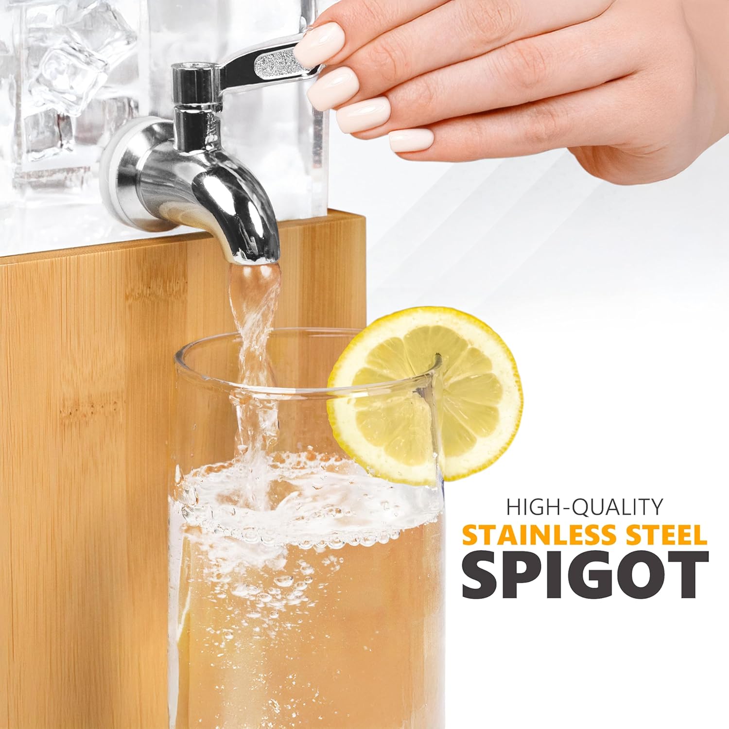 Acrylic beverage dispenser spigot with hand pouring into glass; bamboo base