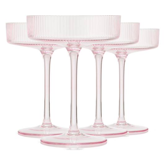 Set of 4 ribbed pink champagne coupe glasses with fluted bowl and short stem