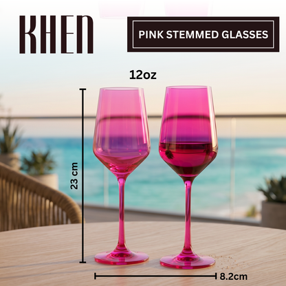 Set of 2 pink stemmed wine glasses with wide bowls and slender stems