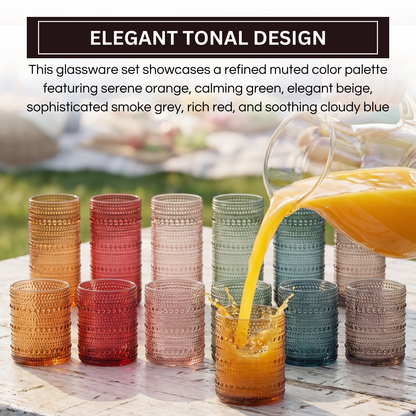 Set of 12 hobnail tumblers in tonal orange, red, beige, green, and blue with juice pour