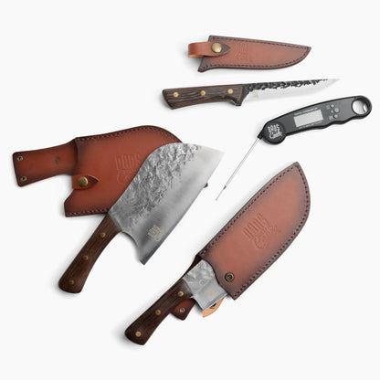 BBQ Beast kit layout: wood-handled knives with leather sheaths and thermometer tool