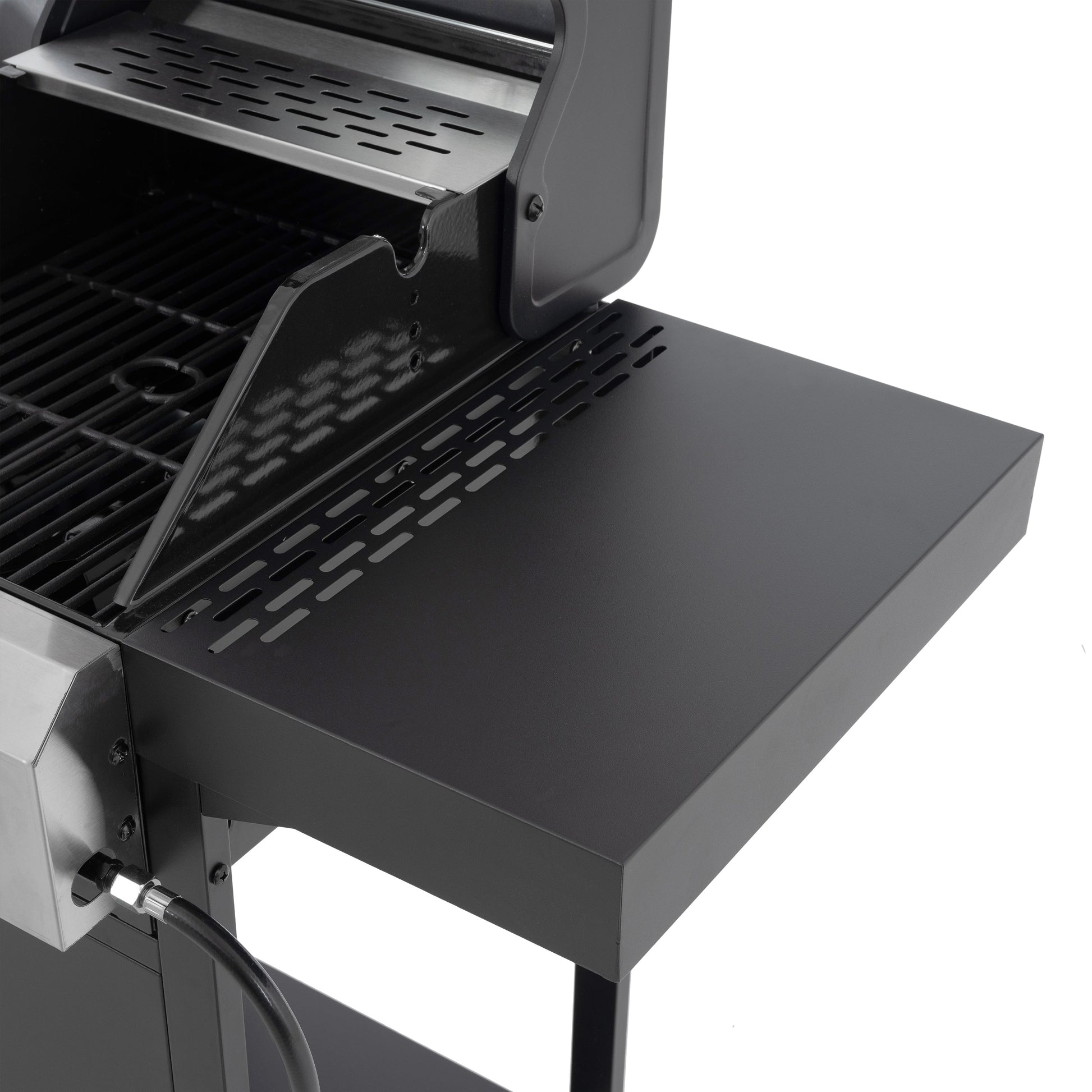 Stainless side griddle surface with vented tray, black grill control area