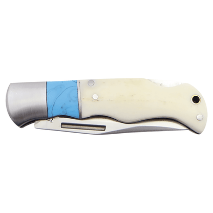 Folding knife with bone white handle, blue inlay, and stainless folded blade