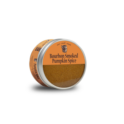 Smoked pumpkin spice tin with orange label and brown seasoning powder