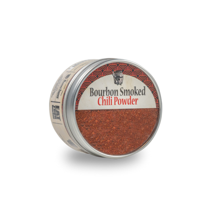 Bourbon smoked chili powder jar with metal lid and red chili powder