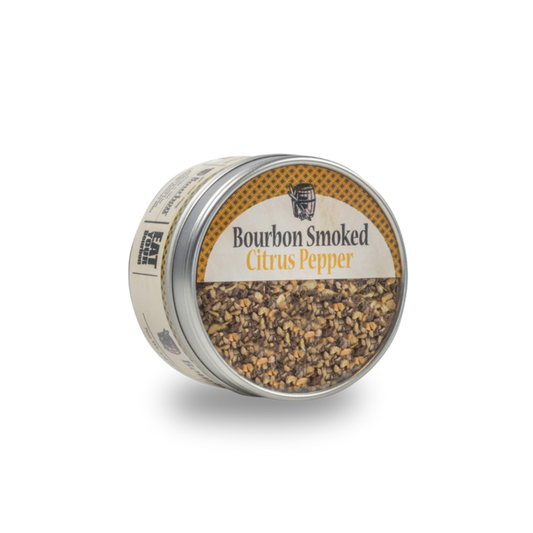 Smoked citrus pepper jar with metal lid, showing coarse pepper seasoning inside