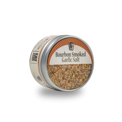 Seasoned garlic salt jar with orange label reading Bourbon Smoked Garlic Salt
