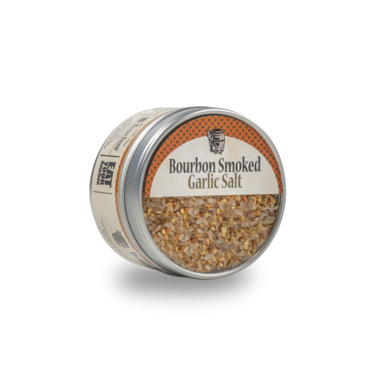 Seasoned garlic salt jar with orange label reading Bourbon Smoked Garlic Salt