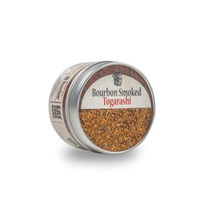 Bourbon smoked togarashi seasoning in open metal container with spice flakes