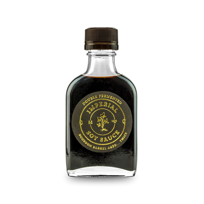 Imperial soy sauce bottle with dark liquid and ribbed cap