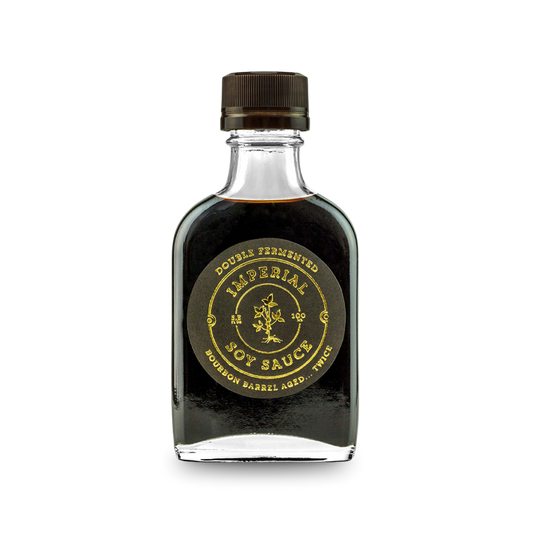 Imperial soy sauce bottle with dark liquid and ribbed cap