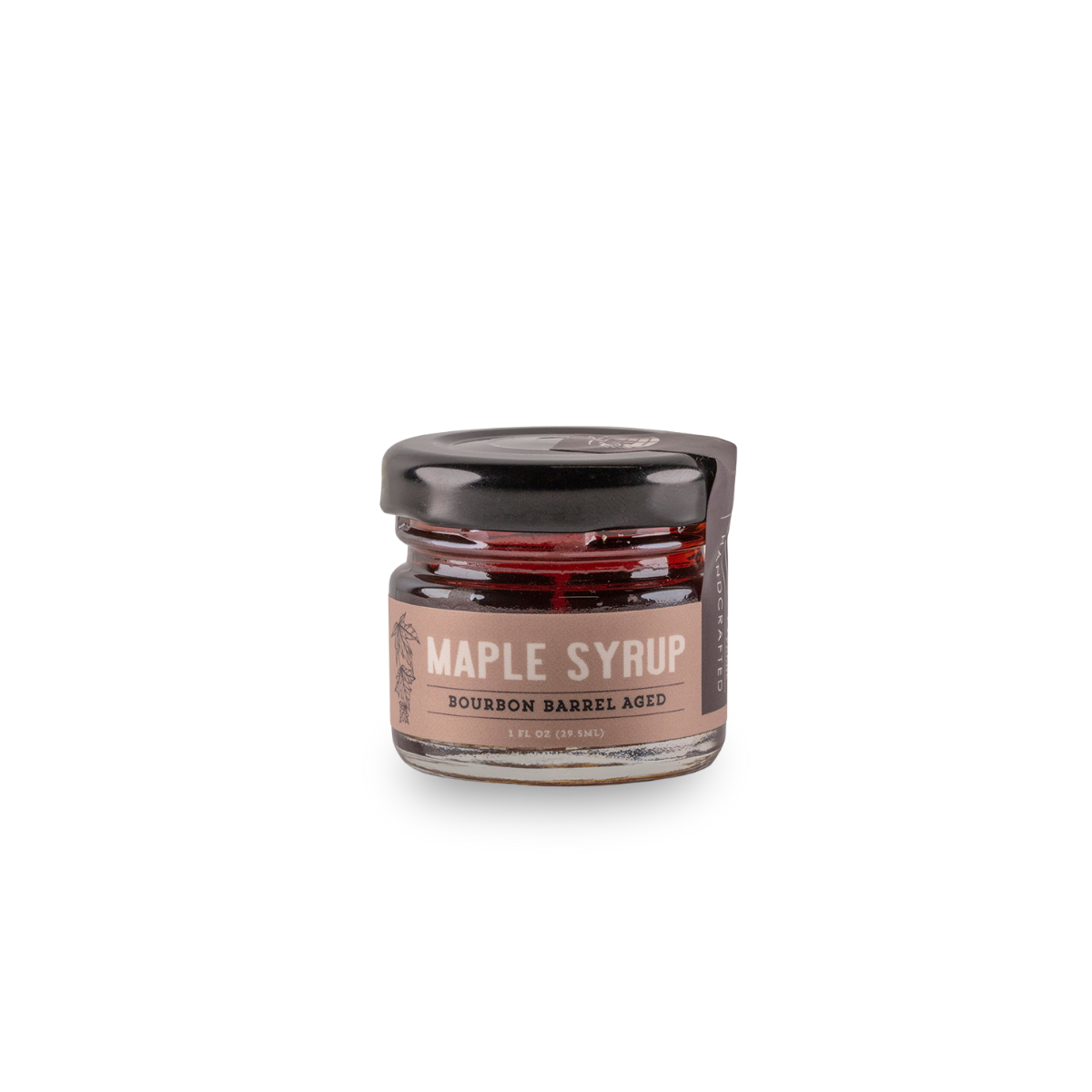 Bourbon barrel-aged maple syrup jar with dark amber syrup and lid