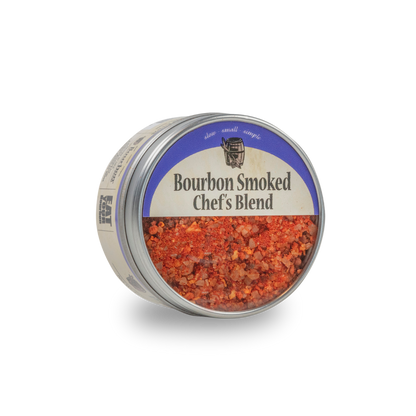 Round spice blend jar with silver lid, blue label, and red-orange seasoning inside